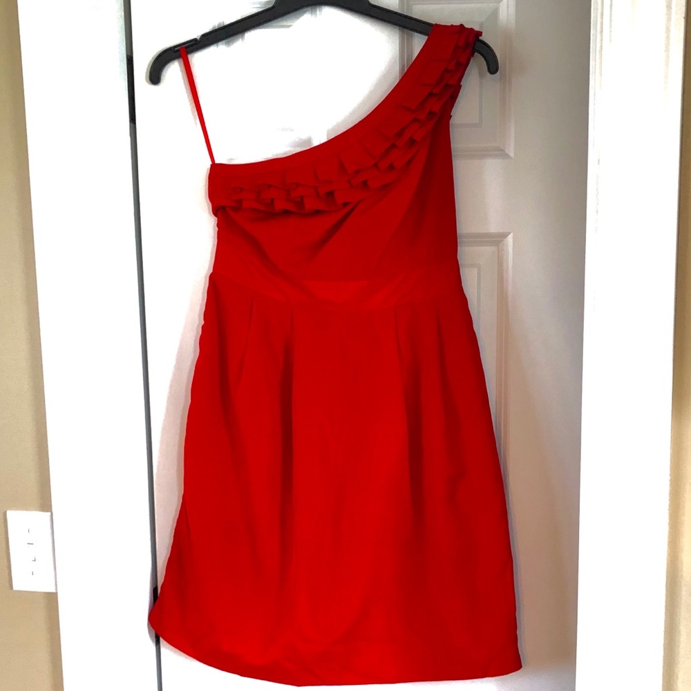 Red one-strap “wedding guest” dress